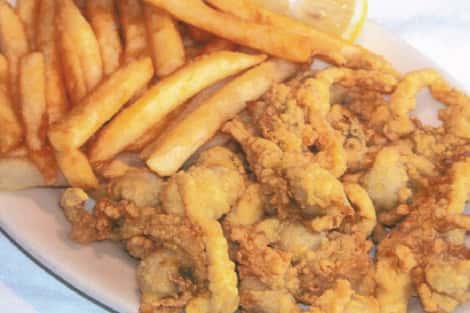 Fried seafood served with French fries