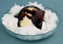 Vanilla ice cream served with chocolate syrup