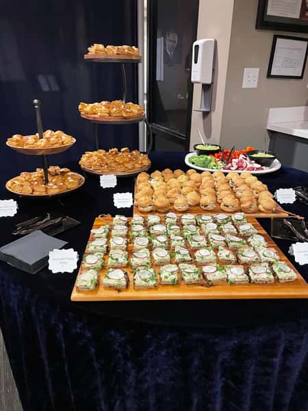 catering table with assortment of foods