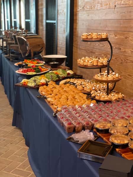 catering table with assortment of foods