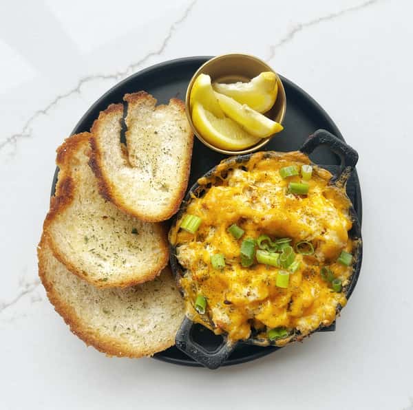 fresh Louisiana lump crab, MS State Edam cheese, mascarpone, house smoked cajun seasonings, toasts and lemon wedges