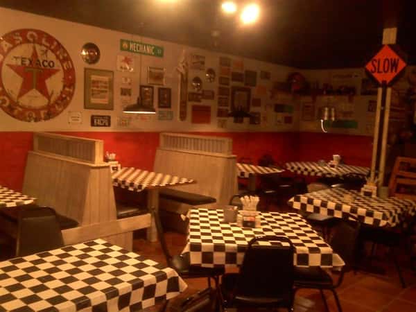 Dining area with vintage decorations on the wall