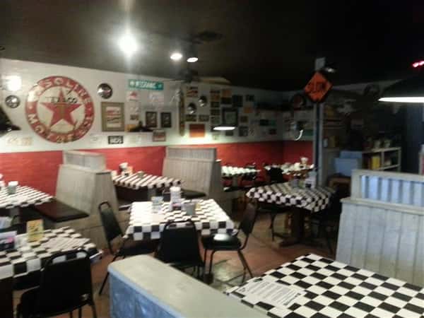 Checkered dining tables and vintage wall decorations