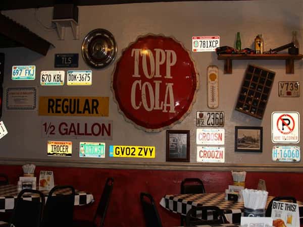 Walls filled with vintage decorations and license plates