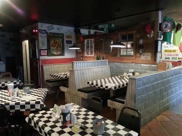 Checkered dining tables and vintage wall decorations