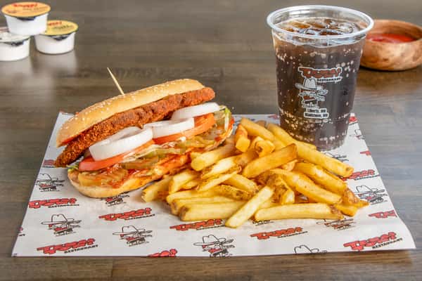 Texas Tom's Italian sandwich combo with fresh toppings, crispy fries, and a soft drink