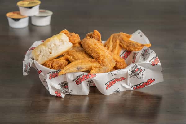Texas Tom's four-piece crispy hot wings served fresh