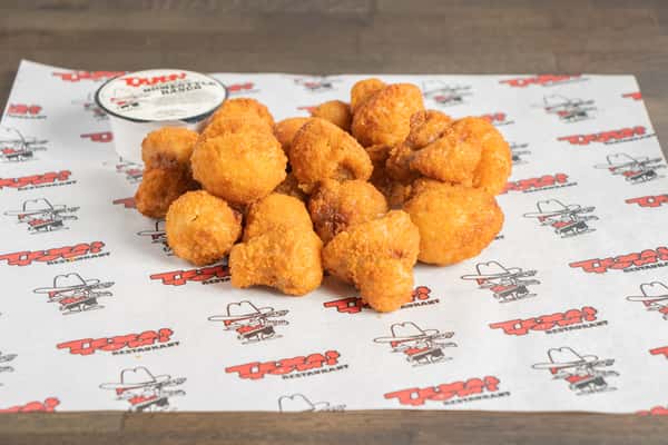 Golden crispy fried mushrooms served at Texas Tom's