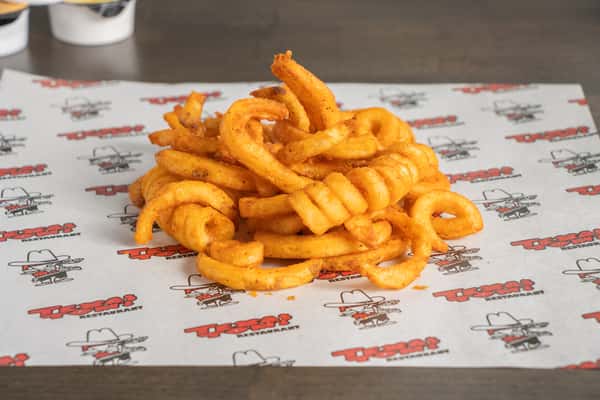 Texas Tom's golden crispy seasoned curly fries