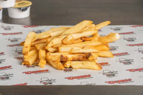 Texas Tom's golden crispy French fries served fresh