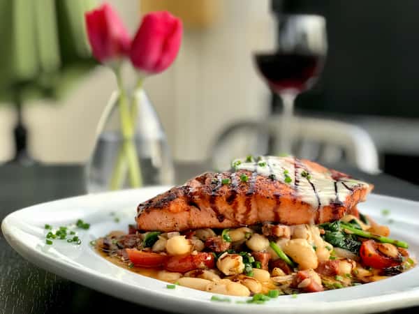 *Blackened Molasses Salmon w/ Spinach, White Bean, Cherry Tomato & Andouille Sausage Sauté