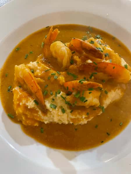 Pan Seared Shrimp & Cheddar Jalapeno Grits w/ Lobster Gumbo Sauce 