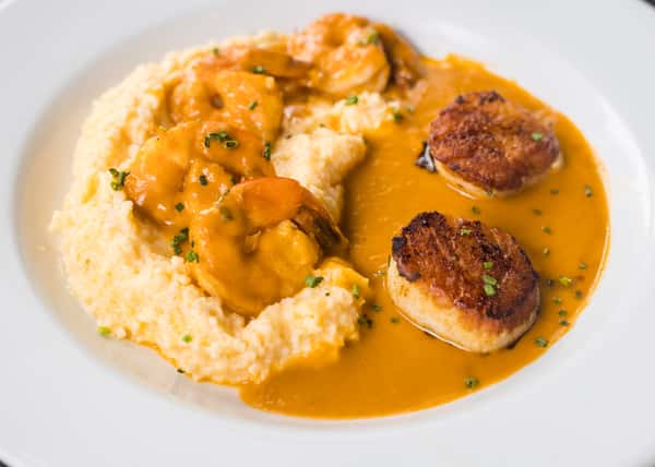 Pan Seared Diver Scallops, Jumbo Shrimp & Cheddar Jalepeno Grits w/ Lobster Gumbo Sauce