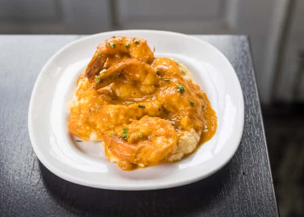 Pan Seared Shrimp & Cheddar Jalapeno Grits  w/ Lobster Gumbo Sauce