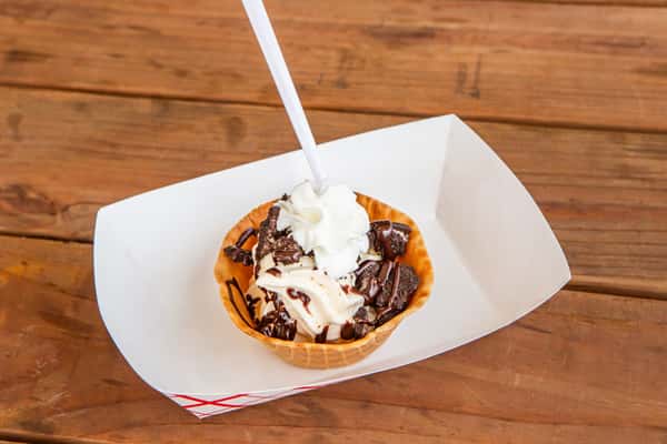 Oreo sundae with vanilla ice cream, chocolate sauce, and cookie pieces at Jimmy's Burgers & Pizza