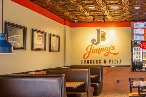 Casual dining area inside Jimmy's Burgers & Pizza restaurant in Hurst, TX