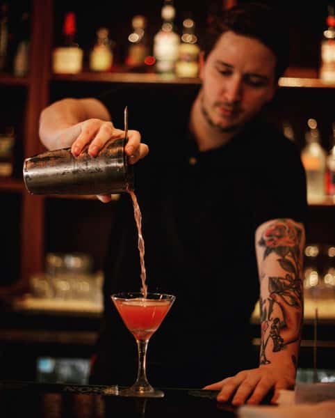 spencer pouring drink