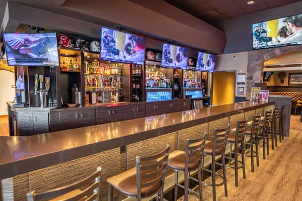 Bar with flat screen tvs