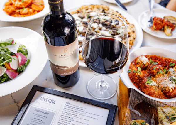 hero shot of wine and plated food