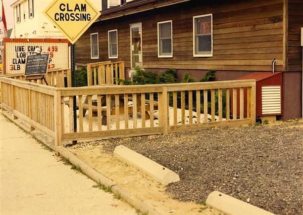 sign that reads clam crossing