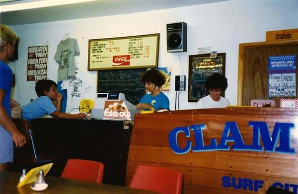two females working behind counter