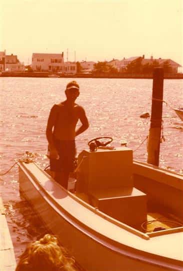 vintage photo of man on boat