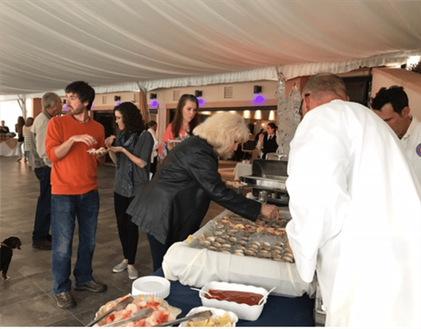 people in line to get oysters