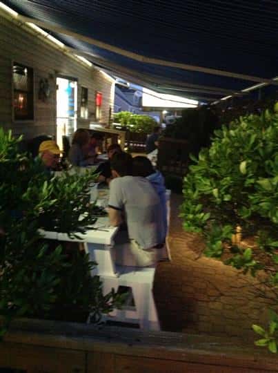 customers sitting outside of boulevard clams