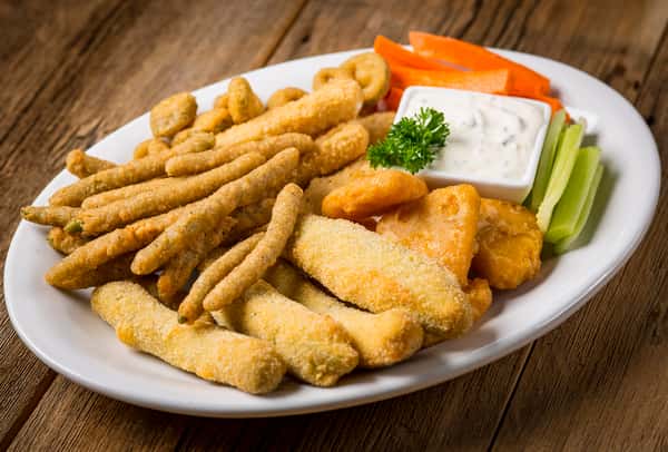 Finger stick snacks served with a sauce