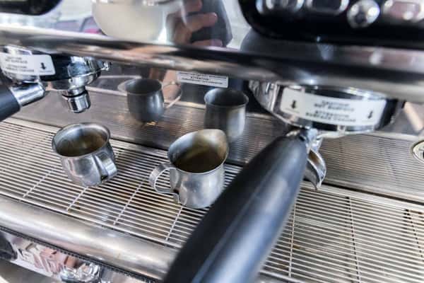 Espresso machine with little metal cups