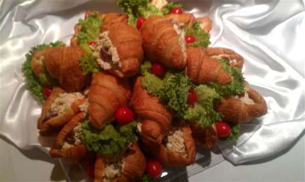 A tray of chicken salad croissants