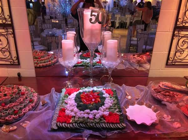 An interior buffet with several trays and bowls