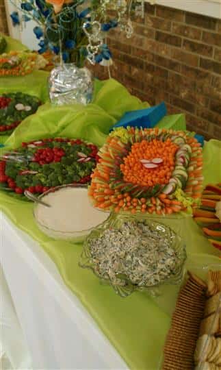 A decorated buffet with salad trays
