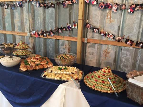 An interior buffet with several catering trays
