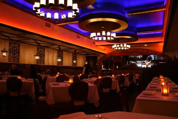 inside view of the dining room with multiple tables
