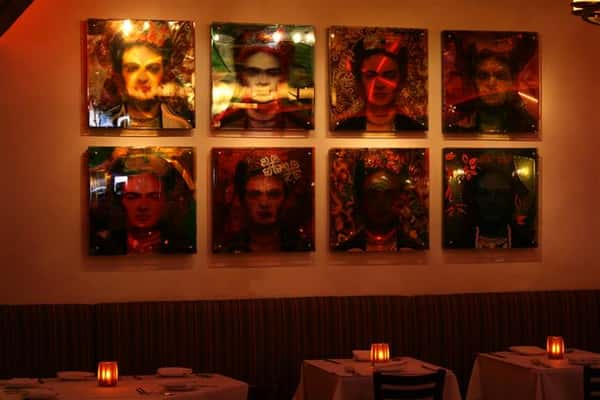 multiple photos on the wall as decoration