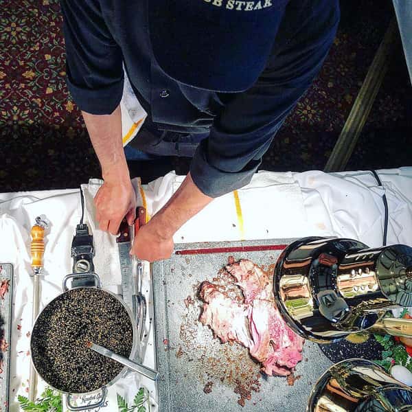 server carving meat