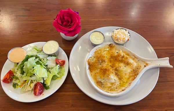 Fresh baked cod served with coleslaw and fries or salad