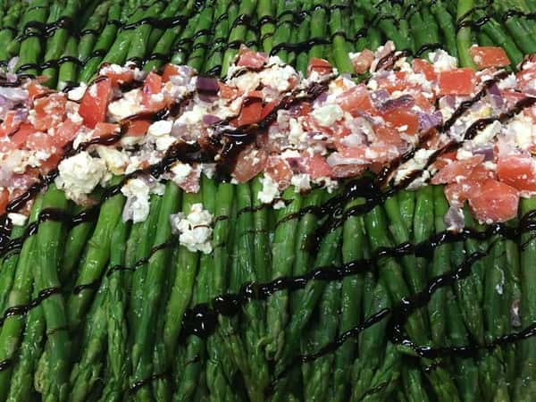 Asparagus, chopped tomatoes, feta cheese with balsamic drizzle