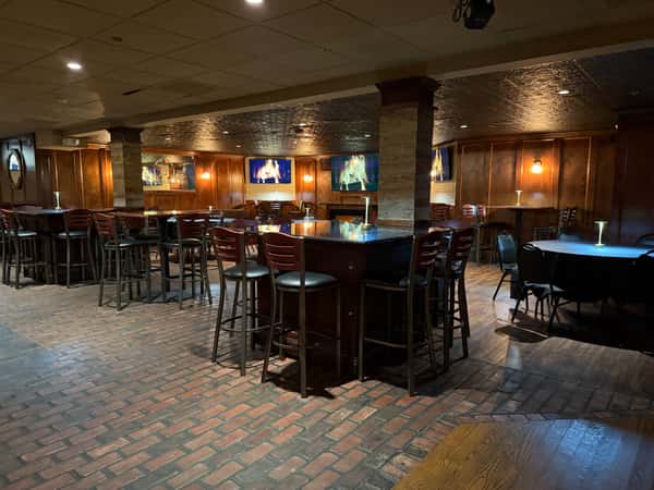 Interior restaurant private dining area with tables laid out in Havertown