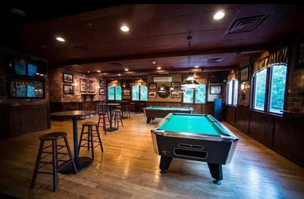 Bar and dining area with pool tables