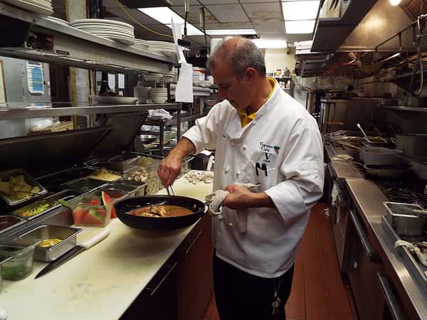Chef plating food