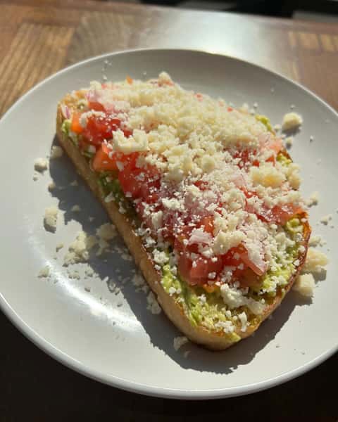 Food with parmesan cheese on a white plate