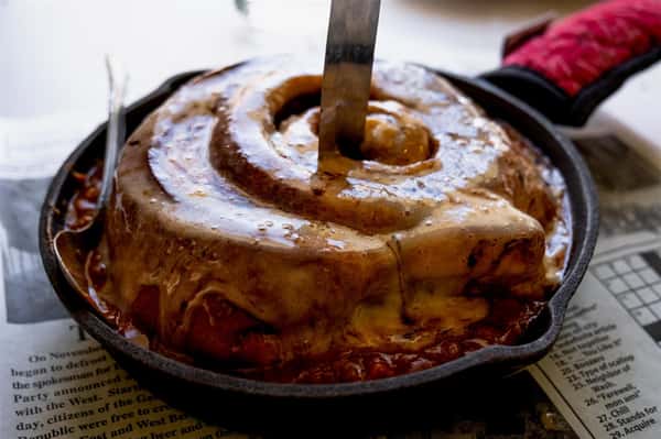 Giant Cinnamon Roll & Chili: House-made chili with ground beef, chili beans, stewed onion & tomatoes with a blend of seasonings simmered for 24 hours. Topped with a GIANT cream cheese cinnamon roll.