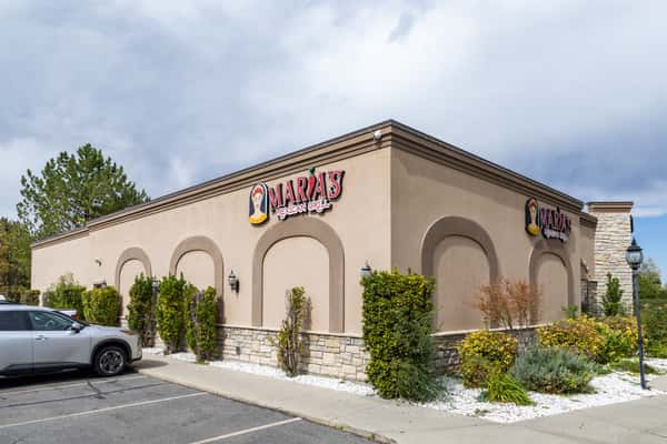Corner exterior view of Maria's Mexican Grill with arched architecture