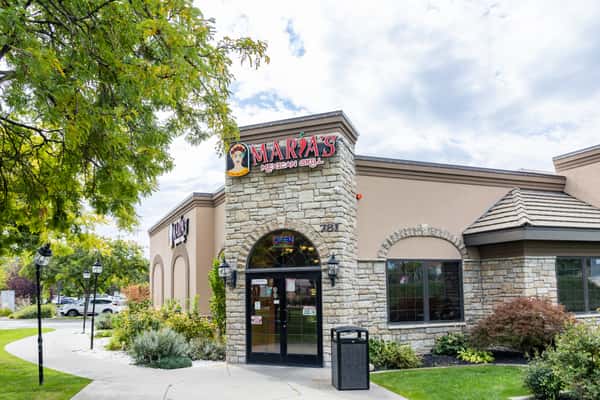 Stone-accented front entrance and signage at Maria's Mexican Grill