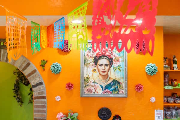 Colorful Mexican-inspired wall art and décor inside Maria's Mexican Grill