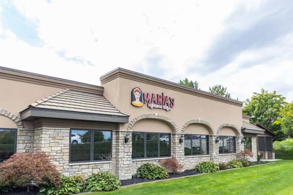Front exterior view of Maria's Mexican Grill with landscaped lawn and entrance