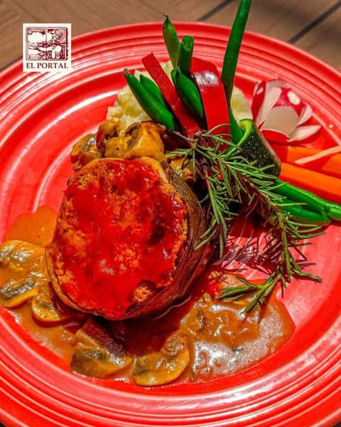 Dinner plans this week? 🍽 Our Chef's Weekly Specials include the mouthwatering Mexican Meatloaf. Paired with our signature Tamarindo Margarita, it's a summer dream. 🌮🍹

Reserve your table now or order online to enjoy El Portal at home!