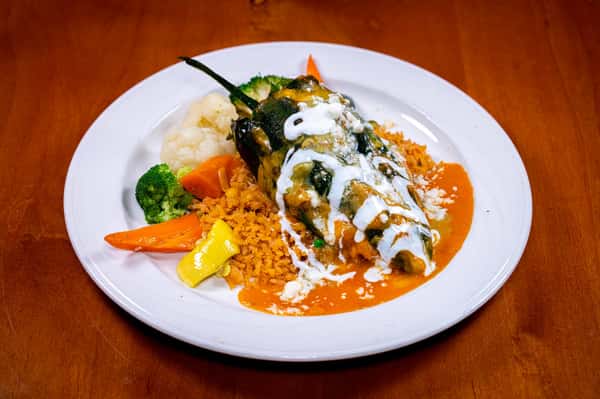 Seafood Chile Relleno is our third special for this week! 🌶

Poblano chile filled with white fish, bay shrimp, crab meat, and cheese, topped with ranchera sauce. Served with Mexican rice and calabasitas.